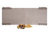 Myrobalan clay-brown yoga mat displayed with whole myrobalan fruits and powdered myrobalan