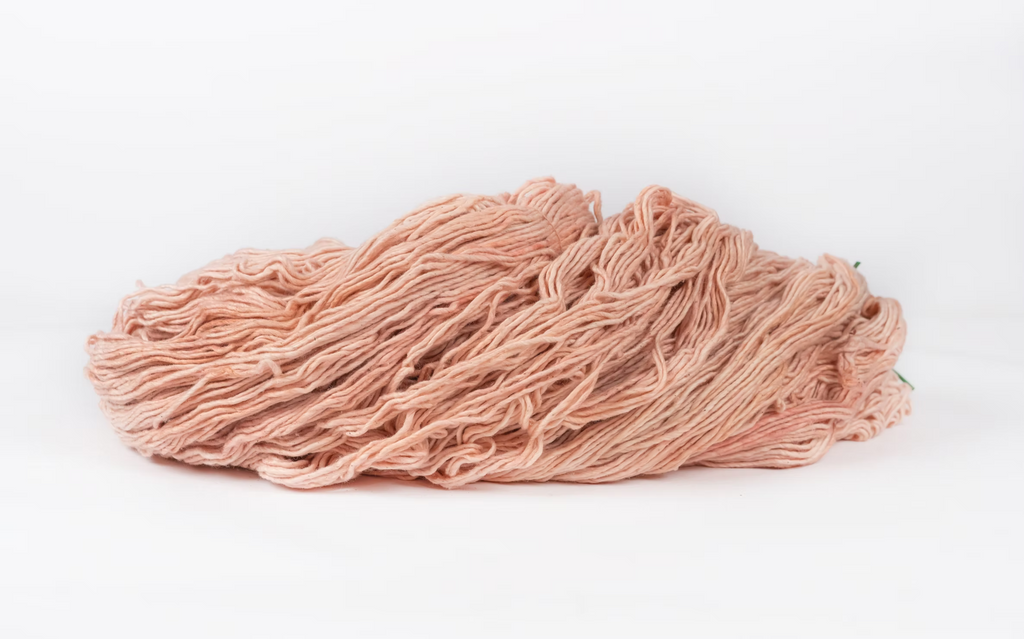 Skein of cotton plant-dyed with Indian madder in soft peach