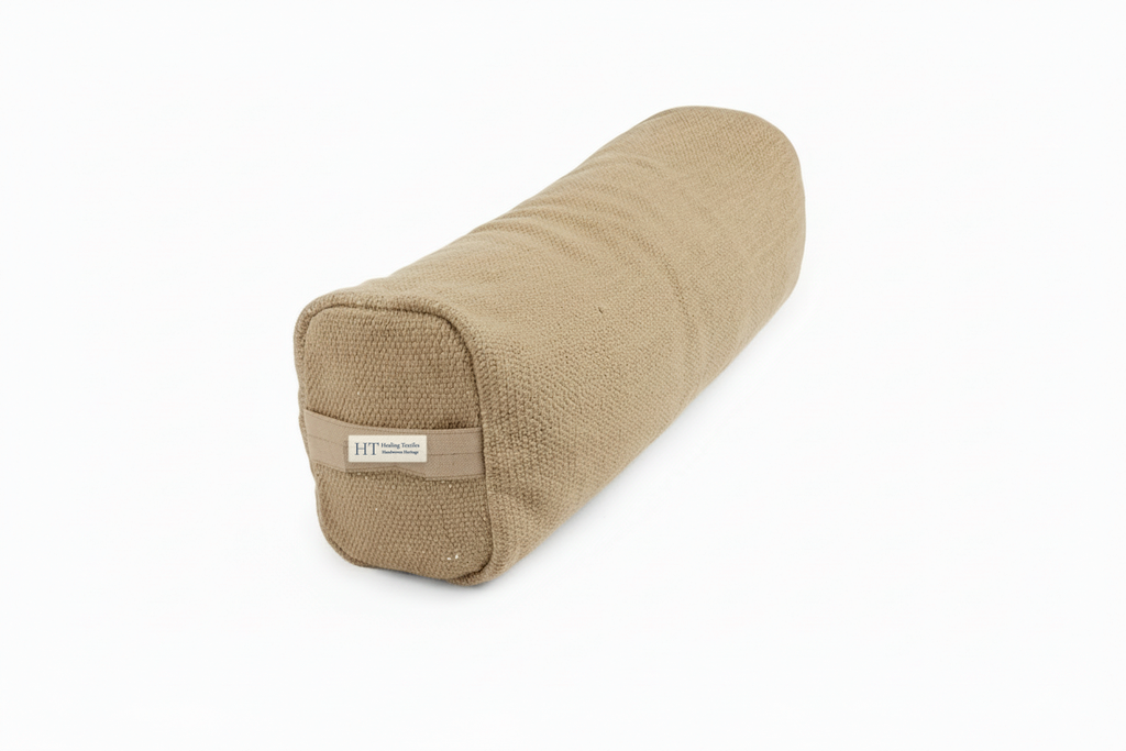 Myrobalan clay-brown pranayama pillow with the Healing Textiles label on its end