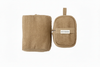Two Myrobalan clay-brown yoga blocks, one showing its zipped side, carry loop and Healing Textiles label