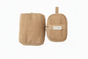 Two Myrobalan clay-brown yoga blocks, one showing its zipped side and Healing Textiles label