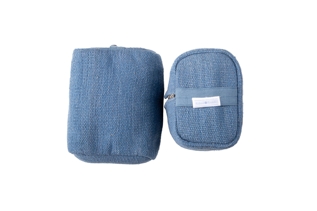 Ayurvastra yoga block in deep indigo blue, rectangular shape with removable handloomed organic cotton cover and integrated carry handle