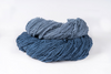 Raw Indigo-dyed organic cotton fabric showing the natural plant dye colour and texture