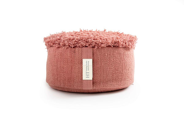 Rose-red Sappanwood meditation cushion with a shaggy top and Healing Textiles label